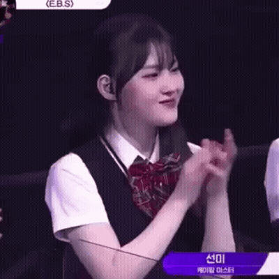 Girl In School Uniform Clapping On Stage GIF
