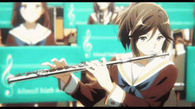 Girl In School Uniform Playing Flute With Sign Saying Kitanoh GIF