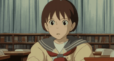 Girl In School Uniform Sitting At Desk GIF