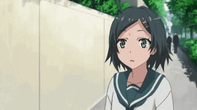 Girl In School Uniform Standing On Sidewalk GIF