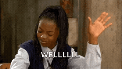 Girl In School Uniform With Hands Up Saying Welllll GIF