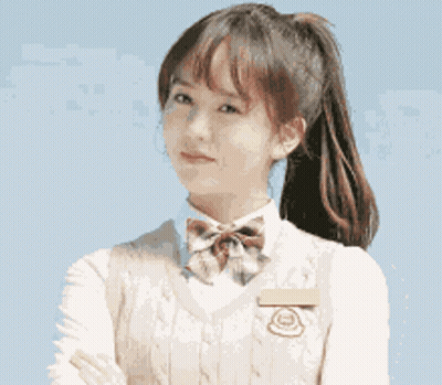 Girl In School Uniform With Ponytail And Bow Tie GIF