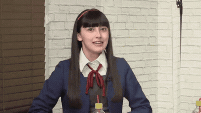 Girl In School Uniform With Soda GIF
