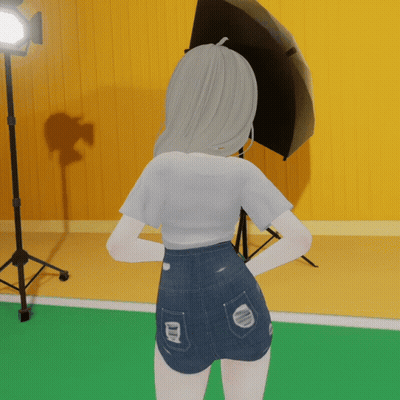 Girl In Shorts And White Shirt Standing In Front Of Camera GIF