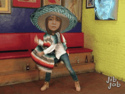 Girl In Sombrero And Poncho Dancing GIF