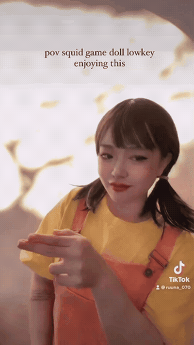 Girl In Squid Game Doll Costume Pointing Finger GIF
