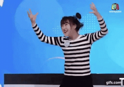 Girl In Striped Shirt Dancing With Arms Outstretched GIF