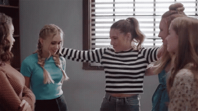 Girl In Striped Shirt In Circle Of Girls GIF