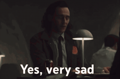 Girl In Suit Peeking Out Door Saying So Anyway GIF