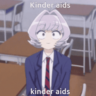 Girl In Suit Saying Kinder Aids Kinder Aids GIF