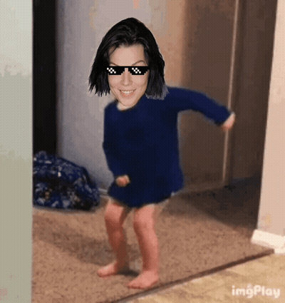 Girl In Sunglasses And Blue Sweater Dancing GIF