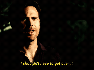 Girl In Sunglasses And Zhotcha Shirt In Front Of Number One GIF