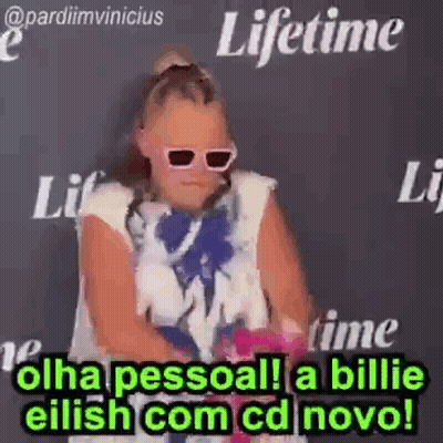 Girl In Sunglasses Before Black Wall GIF