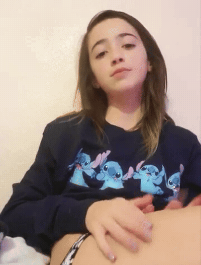Girl In Sweatshirt With Stitches GIF