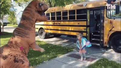 Girl In T-Rex Costume Getting On School Bus GIF