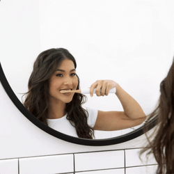 Girl In The Mirror Brushing Teeth GIF