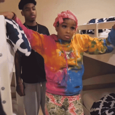 Girl In Tie Dye Sweatshirt Saying I Love You In Front Of Bunk Bed GIF