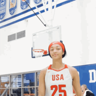 Girl In USA 25 Jersey In Front Of Basketball Net GIF