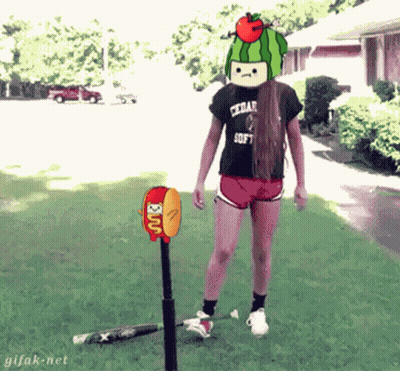 Girl In Watermelon Hat Next To Hot Dog And Bat GIF