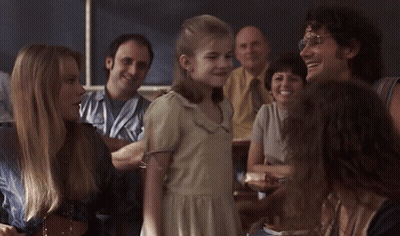 Girl In White Dress And Man With Glasses GIF