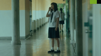 Girl In White Shirt And Black Skirt Hallway GIF