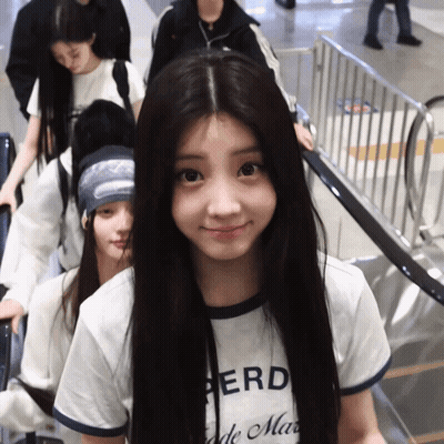 Girl in White Shirt Saying Herd