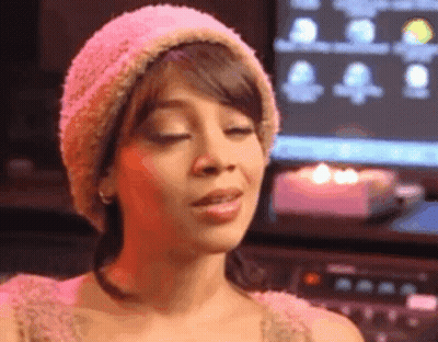 Girl In White Skirt And Black Jacket Dancing In Classroom GIF