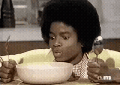 Girl In Witch Hat Holding Drink With Straw GIF