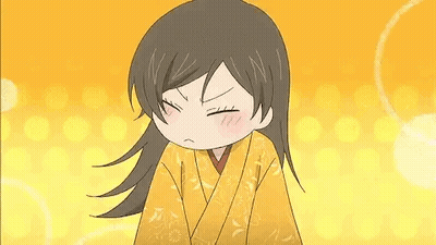 Girl In Yellow Kimono Making Funny Face GIF