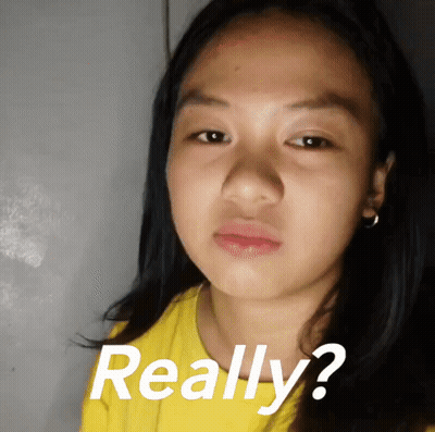 Girl In Yellow Shirt Making Funny Face Really GIF