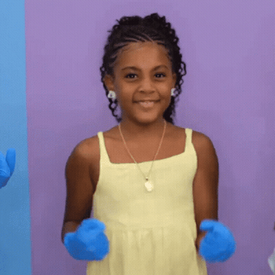 Girl In Yellow Tank Top And Blue Gloves GIF