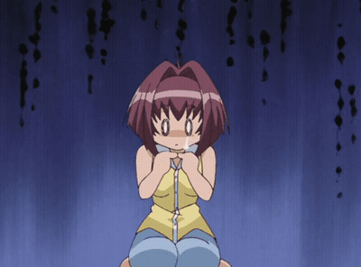 Girl In Yellow Tank Top Kneeling Hands On Chest GIF