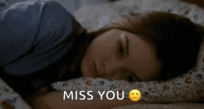 Girl Laying In Bed Sad Face Miss You GIF