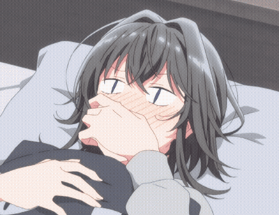 Girl Laying On Bed Covering Mouth With Hands GIF
