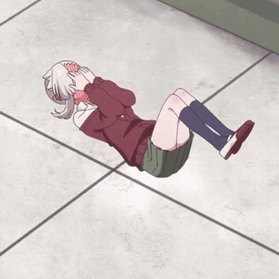 Girl Laying On Floor With Legs Crossed And Head Down GIF