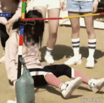 Girl Laying On Ground In Front Of Hula Hoop Ayakagif