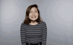 Girl Looking Around Awkward Smile Reaction  GIF