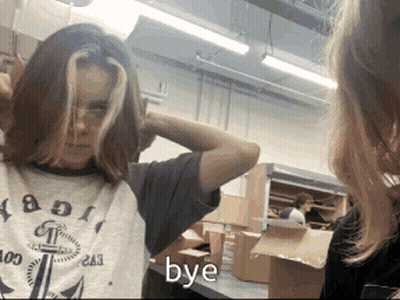 Girl Looking At Mirror Saying Bye GIF