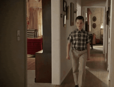 Girl Lying On Bed In Room GIF