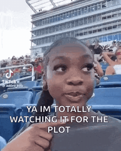 Girl Making Funny Face At Stadium GIF