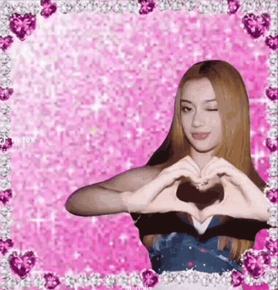 Girl Making Heart Shape With Hands