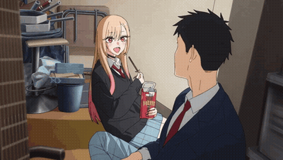 Girl Next To Man Holding Box Of Pocky Sticks GIF