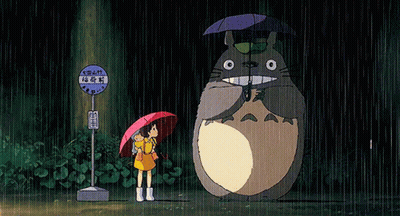 Girl Next To Totoro Holding Umbrellas In Rain GIF
