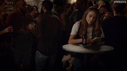 Girl On Bar Being Left On Read GIF
