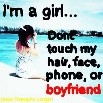 Girl On Beach Talking On Cell Phone Saying I'm A Girl GIF