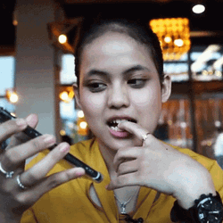 Girl On Phone Nail Biter GIF