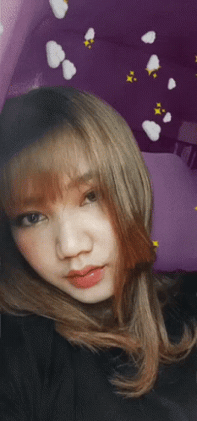 Girl On Purple Background With White Clouds GIF