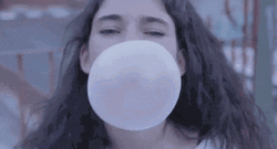 Girl Popping A Huge Bubble Gum GIF