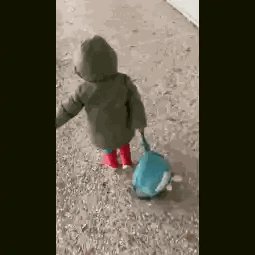 Girl Pulling Backpack In Green Coat Sticker