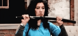 Girl Pulling Out Sword GIF